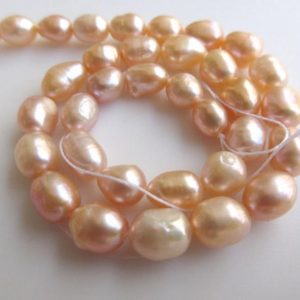 Shop Pearl Bead Shapes! Peach Color Centre Drilled Fresh Water Potato Pearl Beads, High Lustre Fancy Shaped Loose Pearls, 13 Inches, 8mm To 10mm Each, SKU-FP45 | Natural genuine other-shape Pearl beads for beading and jewelry making.  #jewelry #beads #beadedjewelry #diyjewelry #jewelrymaking #beadstore #beading #affiliate #ad