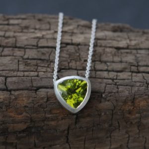 Shop Peridot Pendants! Christmas Gift For Her Peridot Trillion Necklace in Silver, Green Gem Trilliant Necklace | Natural genuine Peridot pendants. Buy crystal jewelry, handmade handcrafted artisan jewelry for women.  Unique handmade gift ideas. #jewelry #beadedpendants #beadedjewelry #gift #shopping #handmadejewelry #fashion #style #product #pendants #affiliate #ad