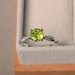 Shop Peridot Rings! Proposal rings, natural peridot rings, August birthstone, round cut green gemstone, solid silver rings | Natural genuine Peridot rings, simple unique handcrafted gemstone rings. #rings #jewelry #shopping #gift #handmade #fashion #style #affiliate #ad