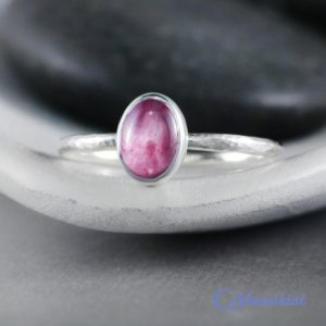Shop Pink Sapphire Jewelry! Dainty Oval Pink Sapphire Promise Ring, Sterling Silver Pink Sapphire Ring | Moonkist Designs | Natural genuine Pink Sapphire jewelry. Buy crystal jewelry, handmade handcrafted artisan jewelry for women.  Unique handmade gift ideas. #jewelry #beadedjewelry #beadedjewelry #gift #shopping #handmadejewelry #fashion #style #product #jewelry #affiliate #ad
