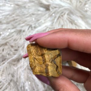 Shop Raw & Rough Tiger Eye Stones! Raw Tiger Eye Crystal | Natural genuine stones & crystals in various shapes & sizes. Buy raw cut, tumbled, or polished gemstones for making jewelry or crystal healing energy vibration raising reiki stones. #crystals #gemstones #crystalhealing #crystalsandgemstones #energyhealing #affiliate #ad