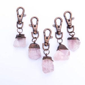 Shop Raw & Rough Rose Quartz Stones! Rose Quartz crystal keychain | Raw crystal keychain | Rose Quartz crystal key clip | Raw quartz key chain | Raw mineral gift | Natural genuine stones & crystals in various shapes & sizes. Buy raw cut, tumbled, or polished gemstones for making jewelry or crystal healing energy vibration raising reiki stones. #crystals #gemstones #crystalhealing #crystalsandgemstones #energyhealing #affiliate #ad