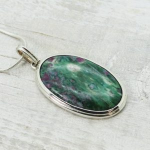 Shop Ruby Zoisite Pendants! Ruby Zoisite pendant natural long oval green ruby stone set on 925 sterling silver bezel solid silver | Natural genuine Ruby Zoisite pendants. Buy crystal jewelry, handmade handcrafted artisan jewelry for women.  Unique handmade gift ideas. #jewelry #beadedpendants #beadedjewelry #gift #shopping #handmadejewelry #fashion #style #product #pendants #affiliate #ad