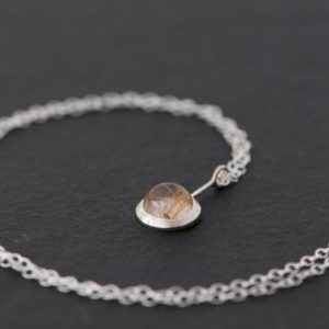 Shop Rutilated Quartz Jewelry! Rutilated Quartz Cabochon Necklace in Silver – Rutilated Quartz Lollipop Pendant | Natural genuine Rutilated Quartz jewelry. Buy crystal jewelry, handmade handcrafted artisan jewelry for women.  Unique handmade gift ideas. #jewelry #beadedjewelry #beadedjewelry #gift #shopping #handmadejewelry #fashion #style #product #jewelry #affiliate #ad
