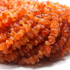 Shop Carnelian Chip & Nugget Beads! 16" Long Natural Carnelian Chips Beads,Uncut Beads,Carnelian Beads,7-9 MM,Jewelry Making,Polished Smooth Beads,Gemstone Bead,Wholesale Price | Natural genuine chip Carnelian beads for beading and jewelry making.  #jewelry #beads #beadedjewelry #diyjewelry #jewelrymaking #beadstore #beading #affiliate #ad