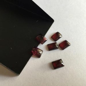 Shop Garnet Cabochons! 50 Pieces Wholesale 8X6mm Each Natural Garnet Rectangle Shaped Smooth Flat Back Loose Cabochons SKU-G10 | Natural genuine stones & crystals in various shapes & sizes. Buy raw cut, tumbled, or polished gemstones for making jewelry or crystal healing energy vibration raising reiki stones. #crystals #gemstones #crystalhealing #crystalsandgemstones #energyhealing #affiliate #ad