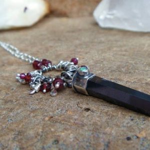 Shop Hematite Necklaces! Hematite crystal point, Opal and Garnet sterling silver necklace // 20" chain // Hematite Jewelry // Handmade jewelry / Metaphysical jewelry | Natural genuine Hematite necklaces. Buy crystal jewelry, handmade handcrafted artisan jewelry for women.  Unique handmade gift ideas. #jewelry #beadednecklaces #beadedjewelry #gift #shopping #handmadejewelry #fashion #style #product #necklaces #affiliate #ad