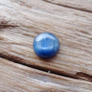 Blue Kyanite round cabochon 15x8mm  gems ring size cabochon | Natural genuine stones & crystals in various shapes & sizes. Buy raw cut, tumbled, or polished gemstones for making jewelry or crystal healing energy vibration raising reiki stones. #crystals #gemstones #crystalhealing #crystalsandgemstones #energyhealing #affiliate #ad