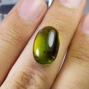 Shop Green Tourmaline Stones & Crystals! Natural good quality ring size green tourmaline cabochon | Natural genuine stones & crystals in various shapes & sizes. Buy raw cut, tumbled, or polished gemstones for making jewelry or crystal healing energy vibration raising reiki stones. #crystals #gemstones #crystalhealing #crystalsandgemstones #energyhealing #affiliate #ad