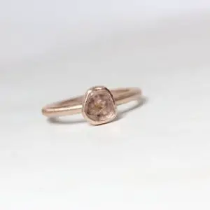Shop Pink Sapphire Jewelry! Raw Peach Pink Sapphire Slice Engagement Ring 14K Rose Gold Low Profile Bezel American Gemstone September Birthstone Montana – Rosenscheibe | Natural genuine Pink Sapphire jewelry. Buy handcrafted artisan wedding jewelry.  Unique handmade bridal jewelry gift ideas. #jewelry #beadedjewelry #gift #crystaljewelry #shopping #handmadejewelry #wedding #bridal #jewelry #affiliate #ad