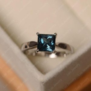 London blue topaz ring, princess cut, sterling silver, solitaire engagement ring | Natural genuine Gemstone rings, simple unique alternative gemstone engagement rings. #rings #jewelry #bridal #wedding #jewelryaccessories #engagementrings #weddingideas #affiliate #ad
