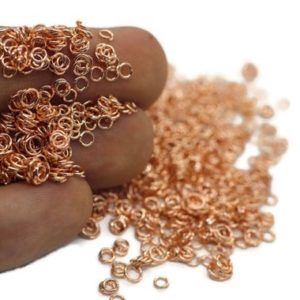 Shop Jump Rings! 3 mm Rose Gold Jump Rings, 3 mm Tiny Jump Ring Connector, Jumpring, chain mail jump, rose jumprings, chain maille, 3mm jumprings, JMPR | Shop jewelry making and beading supplies, tools & findings for DIY jewelry making and crafts. #jewelrymaking #diyjewelry #jewelrycrafts #jewelrysupplies #beading #affiliate #ad