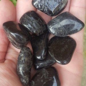 Shop Tumbled Black Tourmaline Crystals & Pocket Stones! BLACK TOURMALINE / Tumbled Gemstone / Healing Crystal | Natural genuine stones & crystals in various shapes & sizes. Buy raw cut, tumbled, or polished gemstones for making jewelry or crystal healing energy vibration raising reiki stones. #crystals #gemstones #crystalhealing #crystalsandgemstones #energyhealing #affiliate #ad