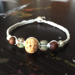 Shop Hemp Jewelry! Carved Bone Hemp Bracelet, Green Turquoise Bracelet, Madre de Cacao Bracelet, Unisex Hemp Bracelet, Carved Bone Jewelry, Men's Hemp Jewelry | Shop jewelry making and beading supplies, tools & findings for DIY jewelry making and crafts. #jewelrymaking #diyjewelry #jewelrycrafts #jewelrysupplies #beading #affiliate #ad