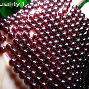15.5" Wine Red garnet 6mm round beads , Red color 6mm natural gemstone, semi-precious stone, small transparent garnet, gemstone wholesaler | Natural genuine beads Array beads for beading and jewelry making.  #jewelry #beads #beadedjewelry #diyjewelry #jewelrymaking #beadstore #beading #affiliate #ad