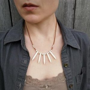 Shop Howlite Necklaces! Tribal White Spike Necklace, Bohemian howlite spike fan necklace in white and metallic bronze | Natural genuine Howlite necklaces. Buy crystal jewelry, handmade handcrafted artisan jewelry for women.  Unique handmade gift ideas. #jewelry #beadednecklaces #beadedjewelry #gift #shopping #handmadejewelry #fashion #style #product #necklaces #affiliate #ad