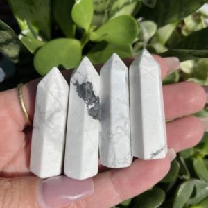 Shop Howlite Points & Wands! White howlite tower | Natural genuine stones & crystals in various shapes & sizes. Buy raw cut, tumbled, or polished gemstones for making jewelry or crystal healing energy vibration raising reiki stones. #crystals #gemstones #crystalhealing #crystalsandgemstones #energyhealing #affiliate #ad