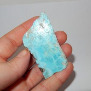 Shop Raw & Rough Larimar Stones! Larimar slab- raw | Natural genuine stones & crystals in various shapes & sizes. Buy raw cut, tumbled, or polished gemstones for making jewelry or crystal healing energy vibration raising reiki stones. #crystals #gemstones #crystalhealing #crystalsandgemstones #energyhealing #affiliate #ad