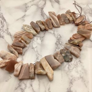 Shop Crystal Beads for Jewelry Making! Peach Moonstone Irregular Matte Pebble Nugget Points Beads 20-25mm 15.5" Strand | Natural genuine beads Quartz beads for beading and jewelry making.  #jewelry #beads #beadedjewelry #diyjewelry #jewelrymaking #beadstore #beading #affiliate #ad