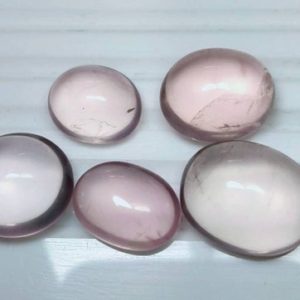 Shop Rose Quartz Cabochons! Natural good quality ring size rose quartz cabochons | Natural genuine stones & crystals in various shapes & sizes. Buy raw cut, tumbled, or polished gemstones for making jewelry or crystal healing energy vibration raising reiki stones. #crystals #gemstones #crystalhealing #crystalsandgemstones #energyhealing #affiliate #ad