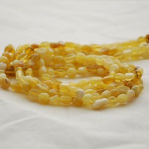 Shop Opal Chip & Nugget Beads! High Quality Grade A Natural Yellow Opal Semi-Precious Gemstone Tumbled Stone Nugget Pebble Beads – 5mm – 8mm – 15" strand | Natural genuine chip Opal beads for beading and jewelry making.  #jewelry #beads #beadedjewelry #diyjewelry #jewelrymaking #beadstore #beading #affiliate #ad