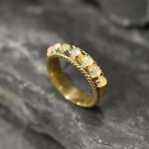 Shop Opal Rings! Gold Opal Band, Opal Band, Natural Opal, October Birthstone, Half Eternity Ring, Gold Vintage Ring, Gold Eternity Ring, Solid Silver Ring | Natural genuine Opal rings, simple unique handcrafted gemstone rings. #rings #jewelry #shopping #gift #handmade #fashion #style #affiliate #ad