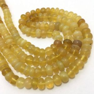 Shop Opal Rondelle Beads! Natural Yellow Opal Plain Rondelle Beads ! Opal Smooth Beads ! Opal Rondelle Beads ! 7 – 7.5 mm Yellow Opal Beads Strand 18" ! Opal Gemstone | Natural genuine rondelle Opal beads for beading and jewelry making.  #jewelry #beads #beadedjewelry #diyjewelry #jewelrymaking #beadstore #beading #affiliate #ad