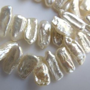 Shop Pearl Bead Shapes! Biwa Pearl, Rectangle Pearls, Ivory Pearls, Fresh Water Pearls, Loose Pearls, 15 Inches, 14mm To 20mm Each, SKU-FP11 | Natural genuine other-shape Pearl beads for beading and jewelry making.  #jewelry #beads #beadedjewelry #diyjewelry #jewelrymaking #beadstore #beading #affiliate #ad