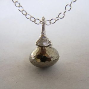 Shop Pyrite Pendants! Faceted Pyrite Onion briolette aka fools gold, sterling silver wrap, pendant necklace | Natural genuine Pyrite pendants. Buy crystal jewelry, handmade handcrafted artisan jewelry for women.  Unique handmade gift ideas. #jewelry #beadedpendants #beadedjewelry #gift #shopping #handmadejewelry #fashion #style #product #pendants #affiliate #ad