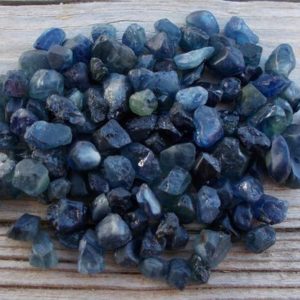 Shop Raw & Rough Sapphire Stones! Raw sapphire,rough sapphire,september birthstone,blue sapphire,raw crystals,gems rocks stones,crystal healing,wicca wiccan,pagan shaman | Natural genuine stones & crystals in various shapes & sizes. Buy raw cut, tumbled, or polished gemstones for making jewelry or crystal healing energy vibration raising reiki stones. #crystals #gemstones #crystalhealing #crystalsandgemstones #energyhealing #affiliate #ad