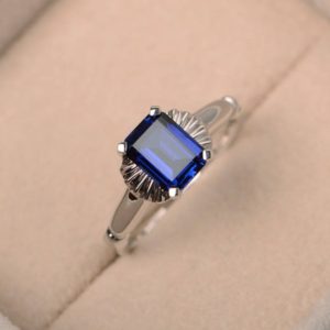 Shop Unique Sapphire Engagement Rings! September birthstone,wedding ring,emerald cut,lab blue sapphire ring,solitaire ring,gemstone ring,sterling silver ring | Natural genuine Sapphire rings, simple unique alternative gemstone engagement rings. #rings #jewelry #bridal #wedding #jewelryaccessories #engagementrings #weddingideas #affiliate #ad