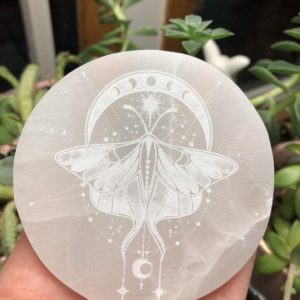Shop Crystal Healing! Selenite Charging Plate, 3" Moth Moon Phase Spirit Animal E1008 Etched Selenite Plate. Charge your crystals in style! Laser Engraved | Shop jewelry making and beading supplies, tools & findings for DIY jewelry making and crafts. #jewelrymaking #diyjewelry #jewelrycrafts #jewelrysupplies #beading #affiliate #ad