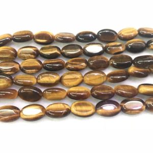 Shop Tiger Eye Bead Shapes! Genuine Yellow Tiger Eyes Oval Natural Grade A Beads 15 inch Jewelry Supply Bracelet Necklace Material Support Wholesale | Natural genuine other-shape Tiger Eye beads for beading and jewelry making.  #jewelry #beads #beadedjewelry #diyjewelry #jewelrymaking #beadstore #beading #affiliate #ad