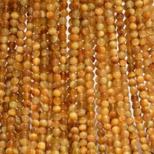 Shop Tiger Eye Round Beads! 4mm Golden Tiger Eye Gemstone AA Yellow Round 4mm Loose Beads 15.5 inch Full Strand (90143510-167) | Natural genuine round Tiger Eye beads for beading and jewelry making.  #jewelry #beads #beadedjewelry #diyjewelry #jewelrymaking #beadstore #beading #affiliate #ad