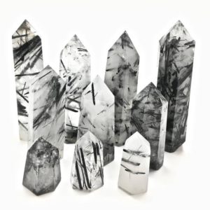 Shop Tourmalinated Quartz Points & Wands! Black Tourmaline Stone in Quartz Crystal Point – Polished Tourmalinated Quartz Tower – Tumbled Black Tourmaline and Clear Quartz Crystal | Natural genuine stones & crystals in various shapes & sizes. Buy raw cut, tumbled, or polished gemstones for making jewelry or crystal healing energy vibration raising reiki stones. #crystals #gemstones #crystalhealing #crystalsandgemstones #energyhealing #affiliate #ad
