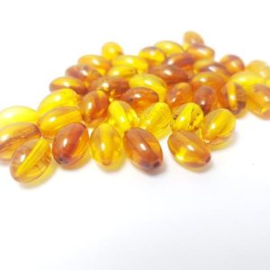 Baltic Amber Beads / Olive Amber Beads / Honey Amber Beads / With Drilled Hole / Jewelry making / Polished Amber Beads / Genuine Amber Beads | Natural genuine other-shape Amber beads for beading and jewelry making.  #jewelry #beads #beadedjewelry #diyjewelry #jewelrymaking #beadstore #beading #affiliate #ad