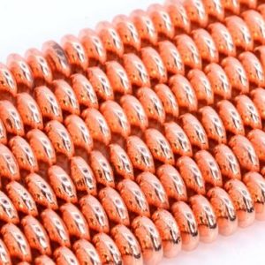 Shop Hematite Rondelle Beads! Shiny Rose Gold Tone Hematite Loose Beads Rondelle Shape 6x2mm 8x3mm 10x3mm | Natural genuine rondelle Hematite beads for beading and jewelry making.  #jewelry #beads #beadedjewelry #diyjewelry #jewelrymaking #beadstore #beading #affiliate #ad