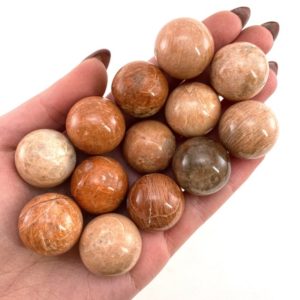 Shop Stone Spheres! Peach moonstone Sphere, crystal ball, moonstone sphere, peach moonstone, crystal sphere | Natural genuine stones & crystals in various shapes & sizes. Buy raw cut, tumbled, or polished gemstones for making jewelry or crystal healing energy vibration raising reiki stones. #crystals #gemstones #crystalhealing #crystalsandgemstones #energyhealing #affiliate #ad