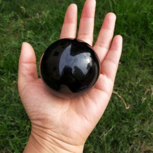 Black Obsidian Crystal Ball Sphere 60mm (2.36") | Natural genuine stones & crystals in various shapes & sizes. Buy raw cut, tumbled, or polished gemstones for making jewelry or crystal healing energy vibration raising reiki stones. #crystals #gemstones #crystalhealing #crystalsandgemstones #energyhealing #affiliate #ad