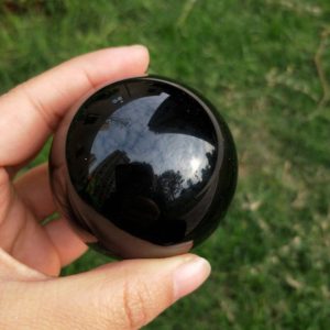Shop Obsidian Shapes! Black Obsidian Crystal Ball Sphere 60mm (2.36") | Natural genuine stones & crystals in various shapes & sizes. Buy raw cut, tumbled, or polished gemstones for making jewelry or crystal healing energy vibration raising reiki stones. #crystals #gemstones #crystalhealing #crystalsandgemstones #energyhealing #affiliate #ad