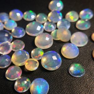 Shop Opal Cabochons! 5-7mm Ethiopian Opal Round Rose Cut Flat Back Cabochons, Natural Rare Ethiopian Opal Round Cabochon, Opal For Jewelry (5Pcs To 10Pcs Option) | Natural genuine stones & crystals in various shapes & sizes. Buy raw cut, tumbled, or polished gemstones for making jewelry or crystal healing energy vibration raising reiki stones. #crystals #gemstones #crystalhealing #crystalsandgemstones #energyhealing #affiliate #ad