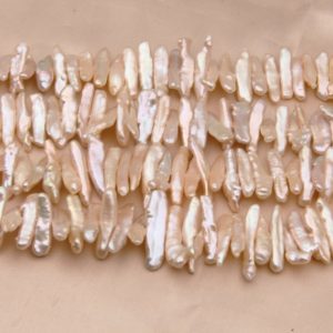 Shop Pearl Bead Shapes! Freshwater Pearl Charms Beads,Length Pillar Champagne Beads,Center Drilled Pearl Beads,High Quality Wedding Pearls Beads,Pearl Jewelry Beads | Natural genuine other-shape Pearl beads for beading and jewelry making.  #jewelry #beads #beadedjewelry #diyjewelry #jewelrymaking #beadstore #beading #affiliate #ad