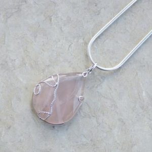 Shop Rose Quartz Pendants! Teardrop Rose Quartz Pendant // Wire Wrap Rose Quartz // Pink Pendant // Sterling Silver // Pink Stone 925 Necklace // Gift for her | Natural genuine Rose Quartz pendants. Buy crystal jewelry, handmade handcrafted artisan jewelry for women.  Unique handmade gift ideas. #jewelry #beadedpendants #beadedjewelry #gift #shopping #handmadejewelry #fashion #style #product #pendants #affiliate #ad