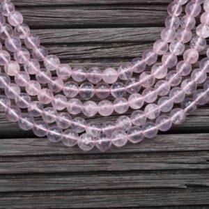 Shop Rose Quartz Round Beads! Rose Quartz (Madagascar) 10-11mm round beads (ETB00464) | Natural genuine round Rose Quartz beads for beading and jewelry making.  #jewelry #beads #beadedjewelry #diyjewelry #jewelrymaking #beadstore #beading #affiliate #ad