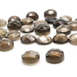 Shop Smoky Quartz Stones & Crystals! Round faceted cabochons,smoky quartz cabochons,smokey gemstones,gemstone cabochons,birthstones,semiprecious stones,natural stones,AA Quality | Natural genuine stones & crystals in various shapes & sizes. Buy raw cut, tumbled, or polished gemstones for making jewelry or crystal healing energy vibration raising reiki stones. #crystals #gemstones #crystalhealing #crystalsandgemstones #energyhealing #affiliate #ad