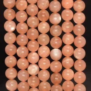 Shop Sunstone Beads! 8mm Orange Sunstone Gemstone Grade AA Round 8mm Loose Beads 15.5 inch Full Strand (90188694-91) | Natural genuine beads Sunstone beads for beading and jewelry making.  #jewelry #beads #beadedjewelry #diyjewelry #jewelrymaking #beadstore #beading #affiliate #ad