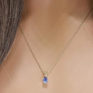 Shop Tanzanite Pendants! Natural Tanzanite Pendant in 14k Gold | Solid 14k Gold | Fine Jewelry | Free Shipping | Teardrop Tanzanite Pendant | December Birthstone | Natural genuine Tanzanite pendants. Buy crystal jewelry, handmade handcrafted artisan jewelry for women.  Unique handmade gift ideas. #jewelry #beadedpendants #beadedjewelry #gift #shopping #handmadejewelry #fashion #style #product #pendants #affiliate #ad