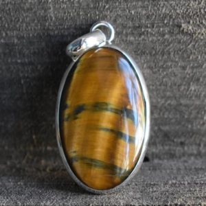 Shop Tiger Eye Pendants! natural tiger eye pendant,925 silver pendant,tiger eye pendant,oval shape pendant,tiger eye gemstone pendant | Natural genuine Tiger Eye pendants. Buy crystal jewelry, handmade handcrafted artisan jewelry for women.  Unique handmade gift ideas. #jewelry #beadedpendants #beadedjewelry #gift #shopping #handmadejewelry #fashion #style #product #pendants #affiliate #ad