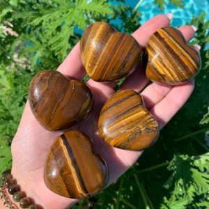 Shop Tiger Eye Shapes! Tiger eye heart, puffy crystal  Heart, protection stone, strength, courage, luck | Natural genuine stones & crystals in various shapes & sizes. Buy raw cut, tumbled, or polished gemstones for making jewelry or crystal healing energy vibration raising reiki stones. #crystals #gemstones #crystalhealing #crystalsandgemstones #energyhealing #affiliate #ad