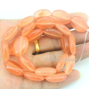 Shop Jade Bead Shapes! 13x18mm Flat Oval Jade Beads,Jade Beads,Light Orange Jade Stone,One Full Strand,Gemstone Beads—15.5 inches—-approx 22 Pieces–BJ033 | Natural genuine other-shape Jade beads for beading and jewelry making.  #jewelry #beads #beadedjewelry #diyjewelry #jewelrymaking #beadstore #beading #affiliate #ad